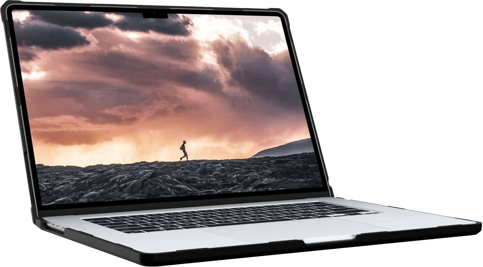 Ein geöffneter Laptop zeigt einen Bildschirmschoner mit einem dramatischen Sonnenuntergang und einer silhouettierten Person auf einem Hügel.