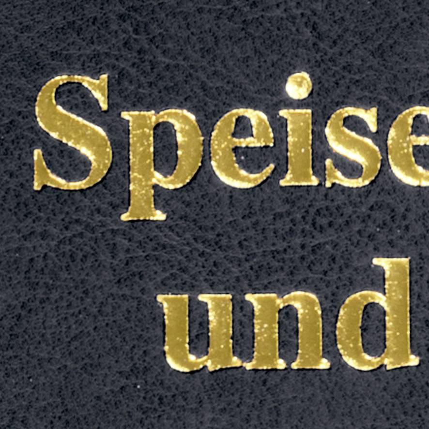 'Speisen und Getränke' in goldener Schrift auf schwarzem Hintergrund.
