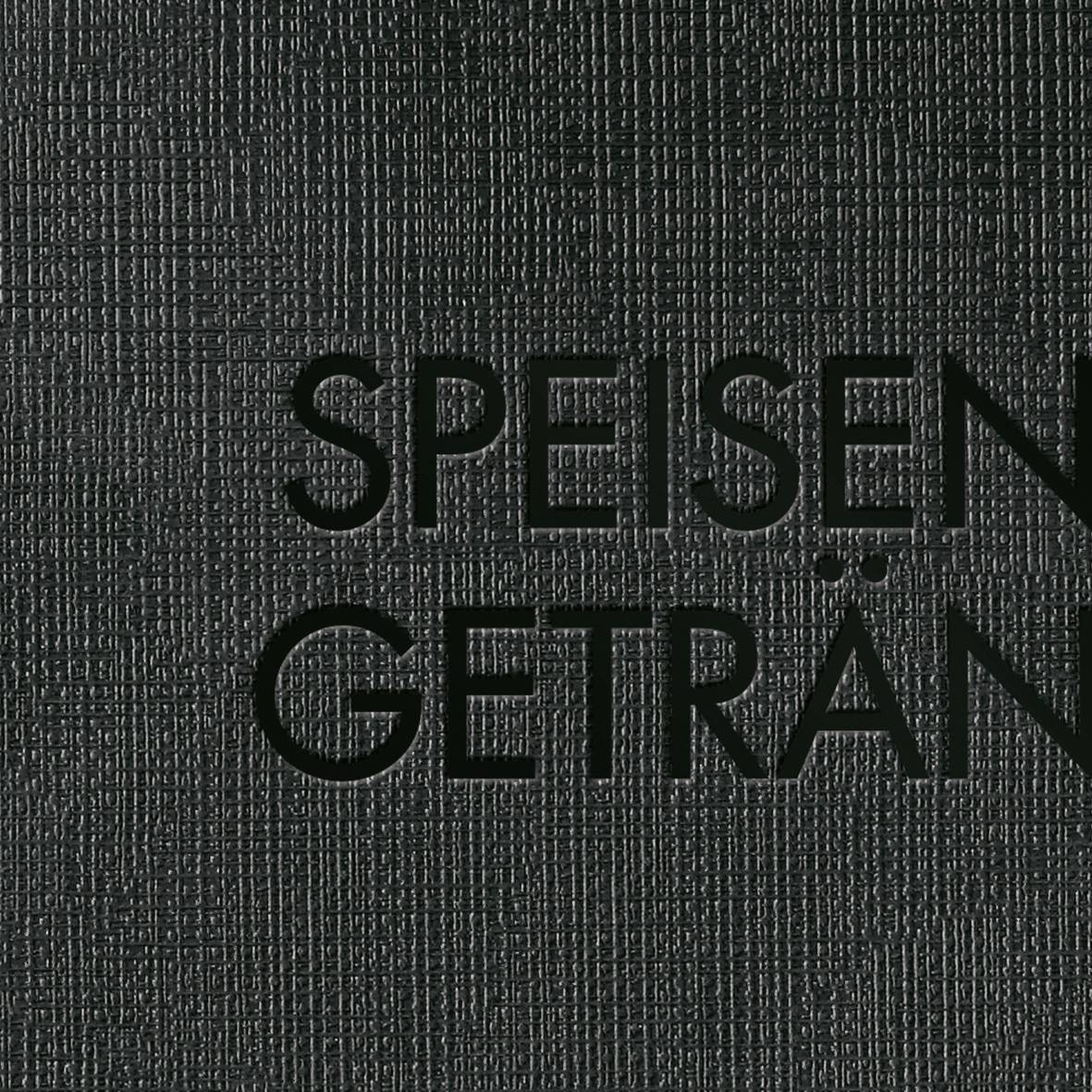 Dunkler, strukturierter Hintergrund mit den Worten 'Speisen' und 'Getränk' in Großbuchstaben geschrieben.