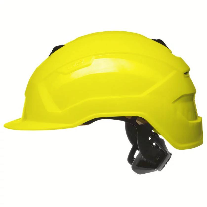 Gelber Schutzhelm, seitliche Ansicht. Der Helm hat eine glatte Oberfläche und einen verstellbaren Gurt. Geeignet für Bauarbeiten.