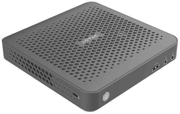 Ein grauer Mini-PC mit Lüftungsschlitzen und Anschlüssen, einschließlich USB und Audiobuchse, auf der Vorderseite.