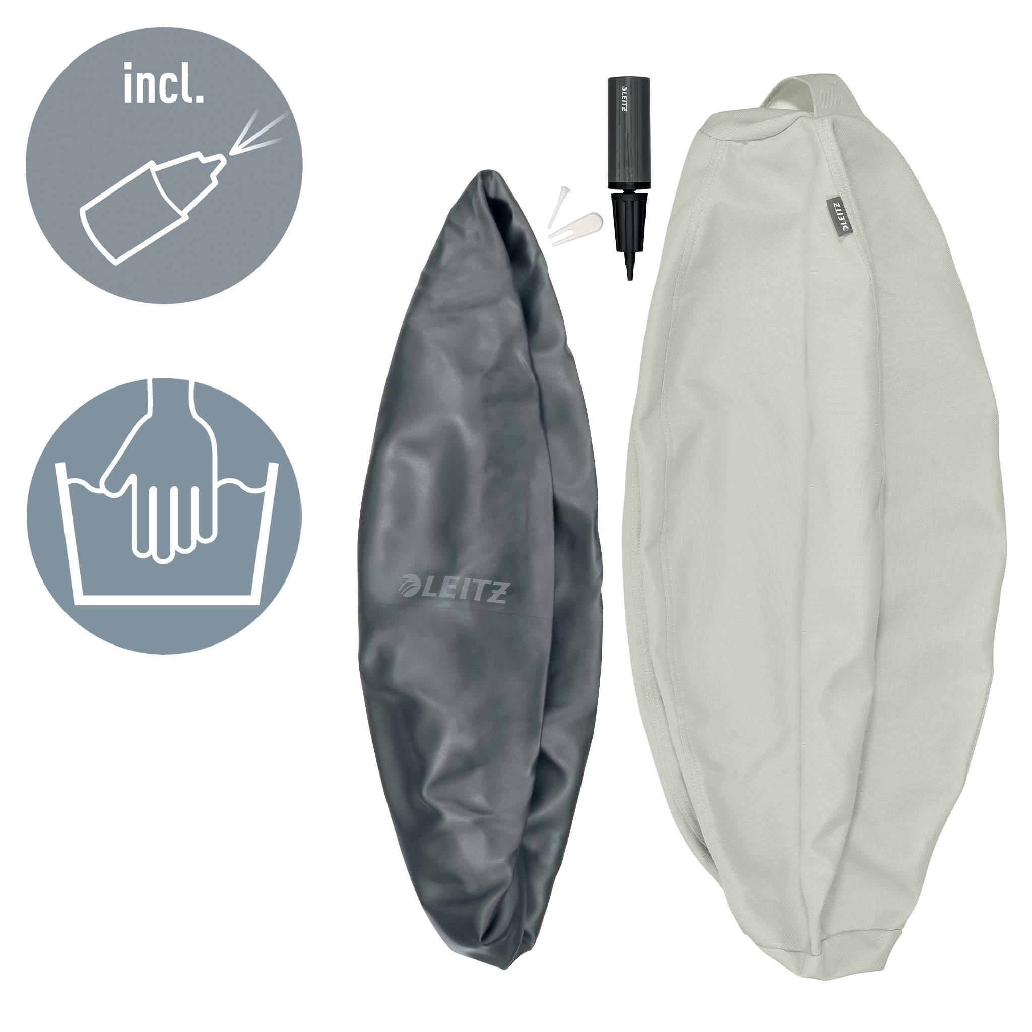 Zwei gepolsterte Heftgeräte, eines in Grau, eines in Silber, mit einer kleinen Pumpe und einem weißen Ventilstopfen. Oben links Symbole: Kleber inkl., Handwäsche empfohlen.