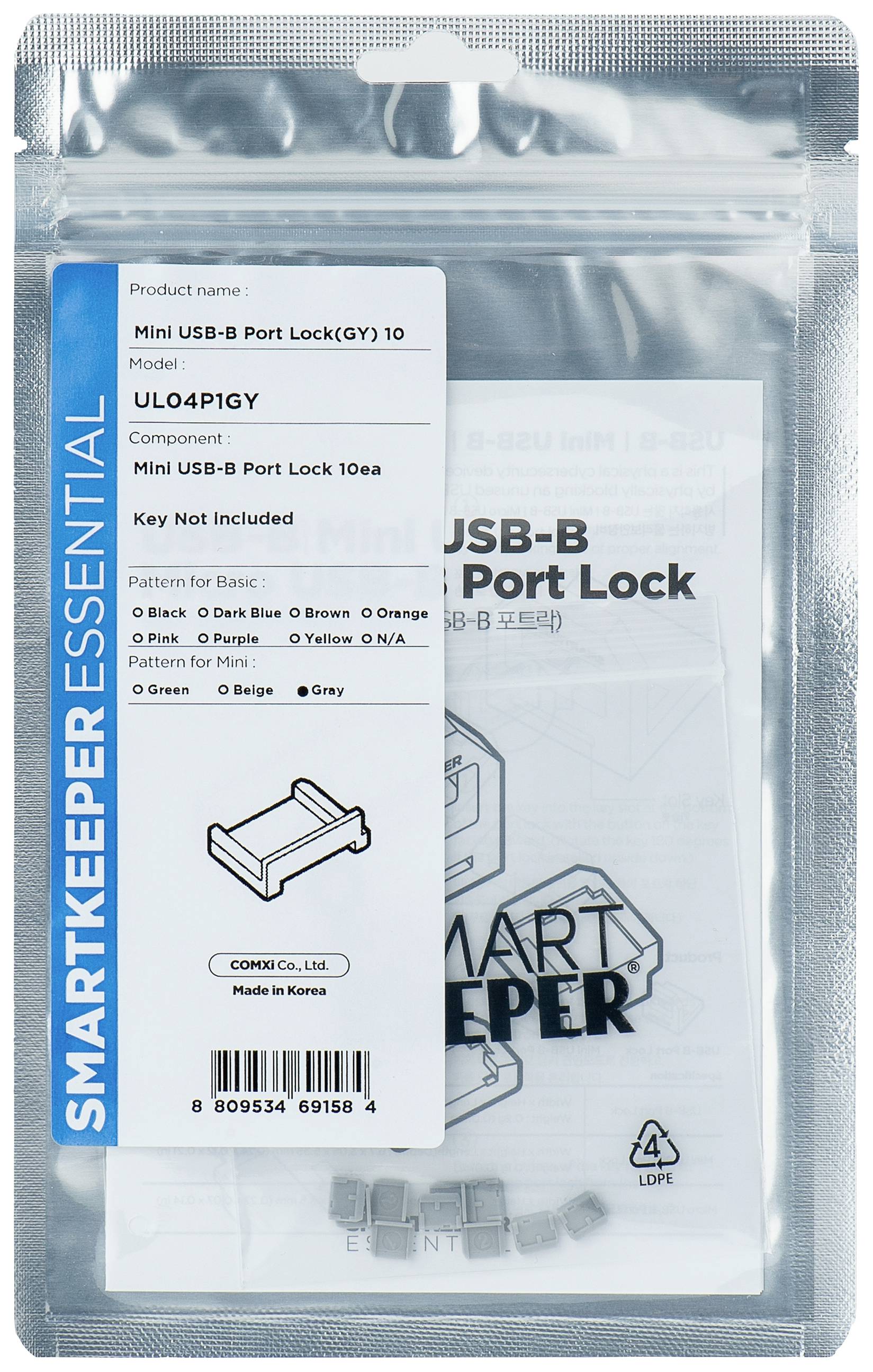 Transparente Verpackung mit einem Mini-USB-B-Port-Verschluss. Aufdruck: 'Smartkeeper Essential', Produktdetails und Herstellungsland.