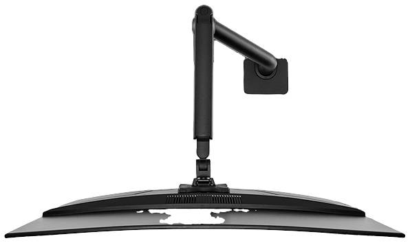 Ein gebogener Monitor, der von einem flexiblen schwarzen Arm gehalten wird, der an einer Wandhalterung befestigt ist.