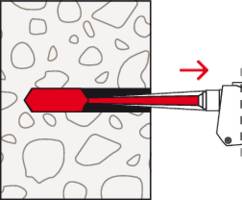 Eine rote Bohrmaschine bohrt horizontal ein Loch in eine Betonwand. Ein roter Pfeil zeigt die Richtung des Bohrens an.