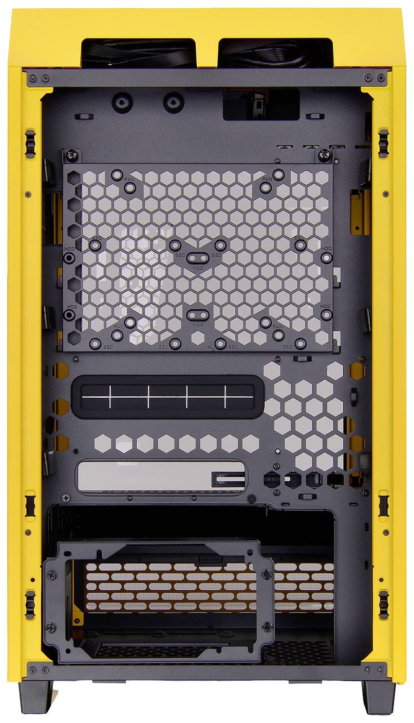Gelbes Computergehäuse von innen, zeigt leere Montageplätze für Komponenten wie Mainboard, Netzteil und Lüfter.