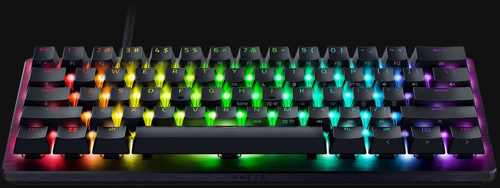 Eine mechanische Tastatur mit RGB-Beleuchtung, die in einem Regenbogenmuster leuchtet. Tasten sind deutlich erkennbar, schwarzer Hintergrund.