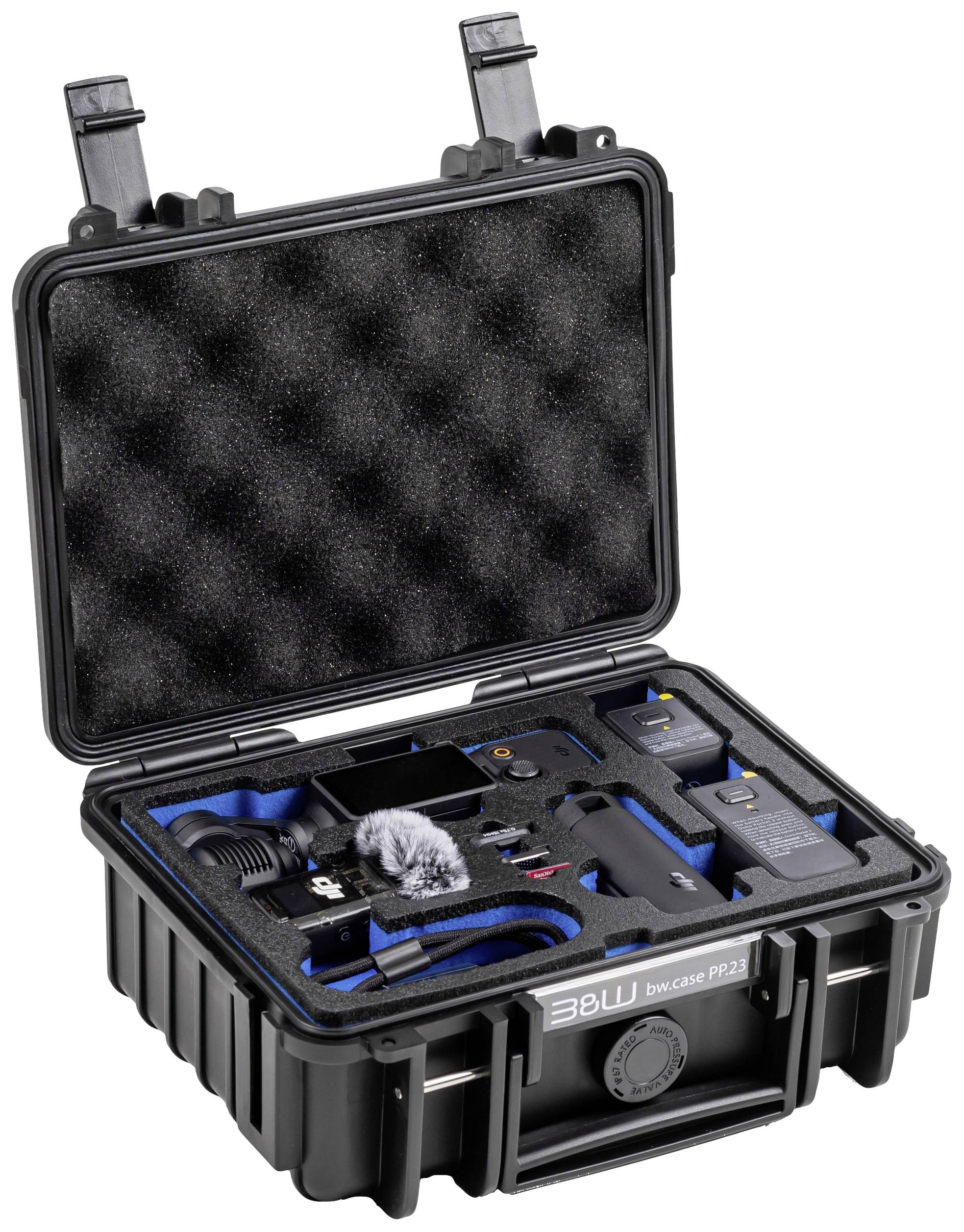 Ein geöffneter, schwarzer Koffer mit verschiedenen elektronischen Geräten und Zubehörteilen in einem formangepassten Schaumstoff.