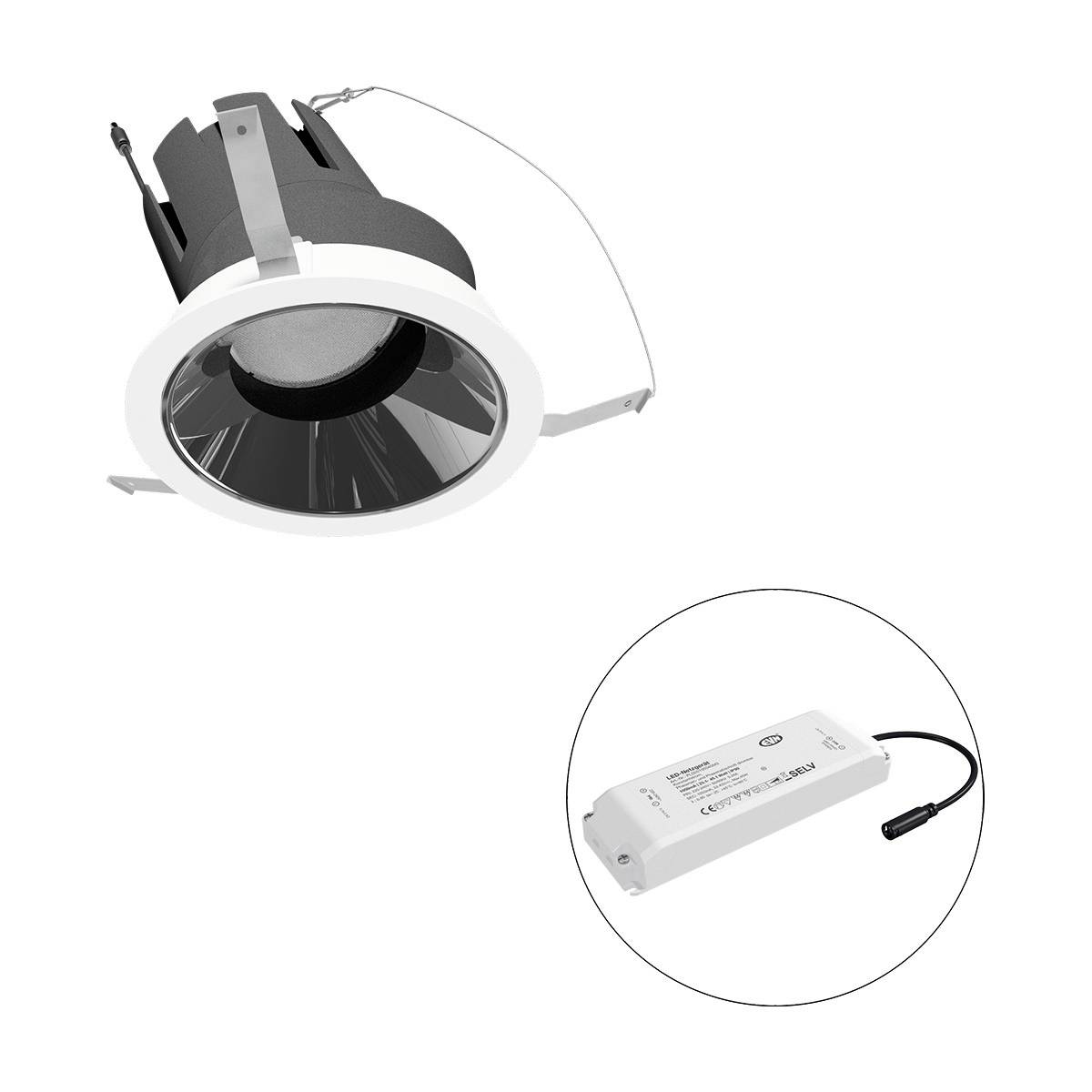Runder Einbaustrahler mit schwarzer Innenfläche und silbernen Details; daneben ein ovales elektronisches Vorschaltgerät.