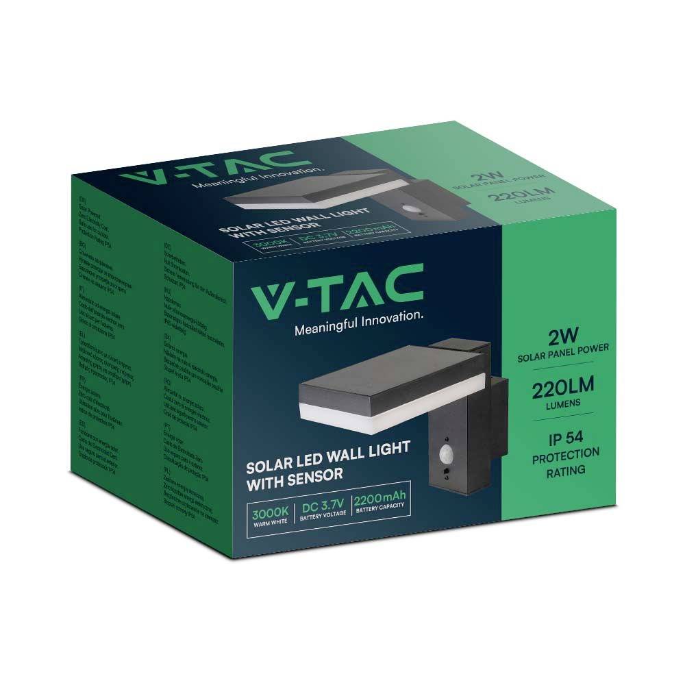Verpackung einer V-TAC Solar-LED-Wandleuchte mit Sensor. Hauptmerkmale: 2W Solarpanel, 2200 Lumen, IP54-Schutz, warmweißes Licht (3000K).