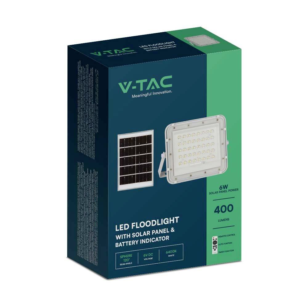 Verpackung einer V-TAC LED-Flutlichtleuchte mit Solarpanel und Batterieanzeige, 400 Lumen, 6W Solarkapazität, grün-weißes Design.