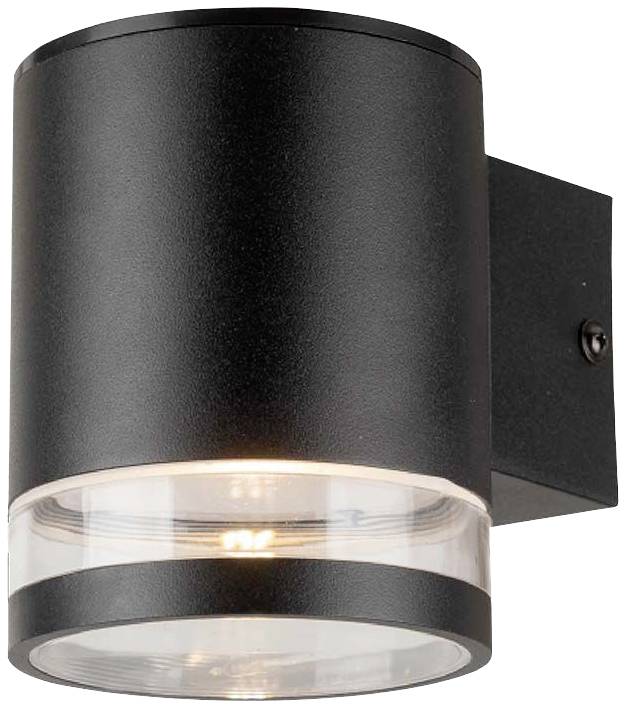 Eine schwarze, zylindrische Wandleuchte mit klarem Glasboden, die eine helle Lichtquelle nach unten abstrahlt.