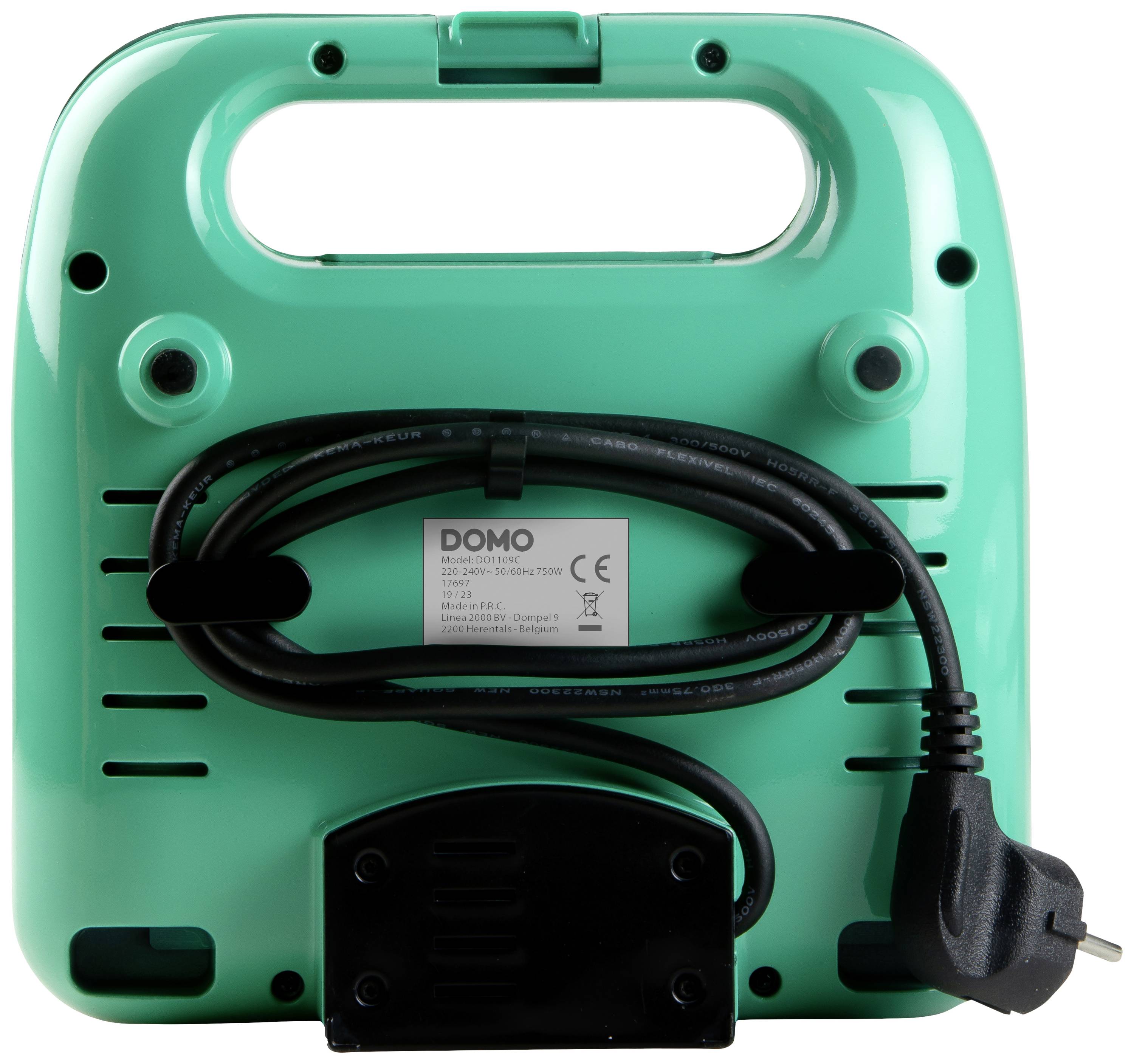 Rückseite eines grünen Elektrogeräts mit Kabelaufwicklung und Stecker, Markenetikett 'DOMO' sichtbar, tragbarer Griff oben.