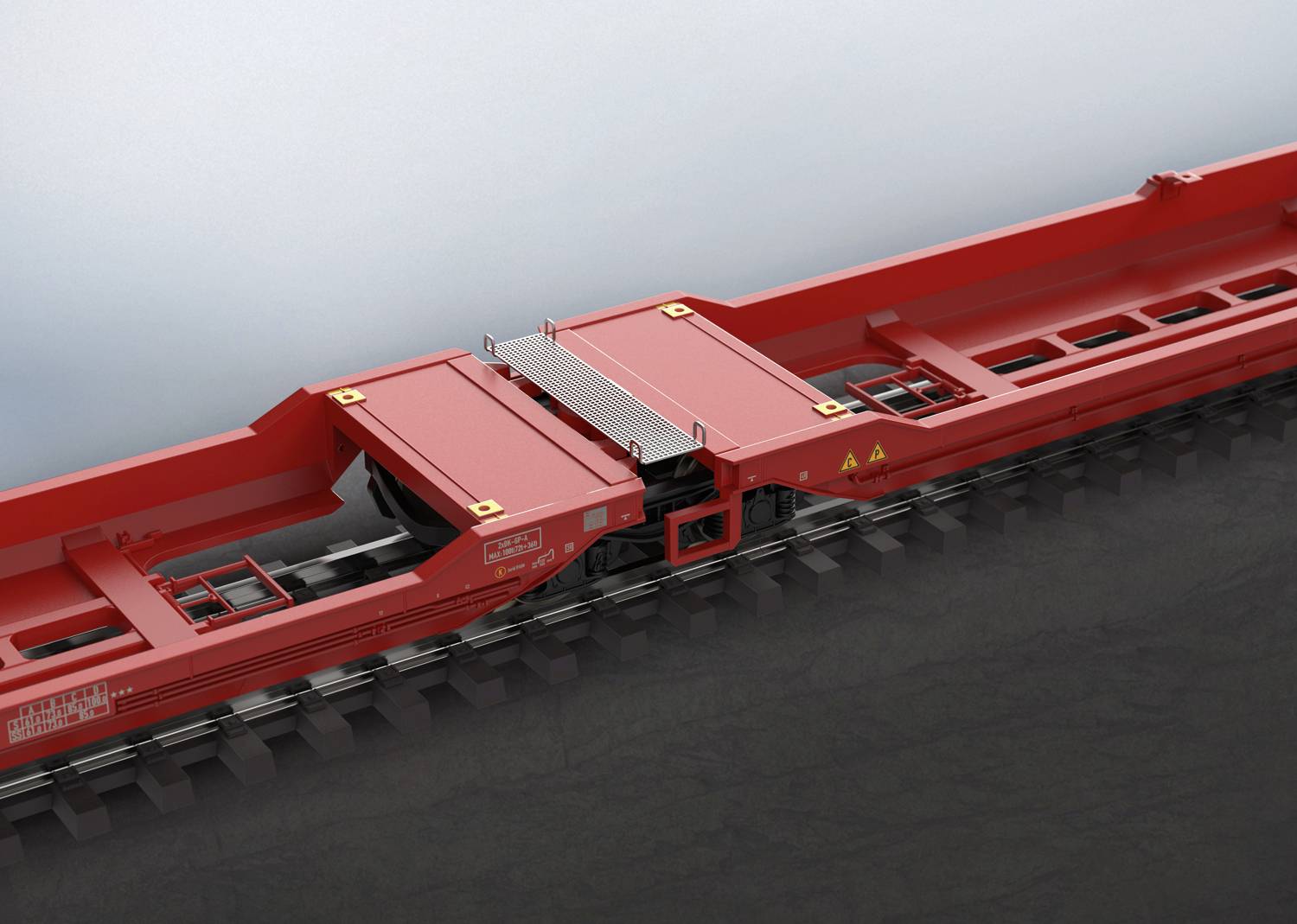 Roter Eisenbahnwagen auf Bahngleisen, Fokus auf Verbindungsmechanismus zwischen den Wagen.