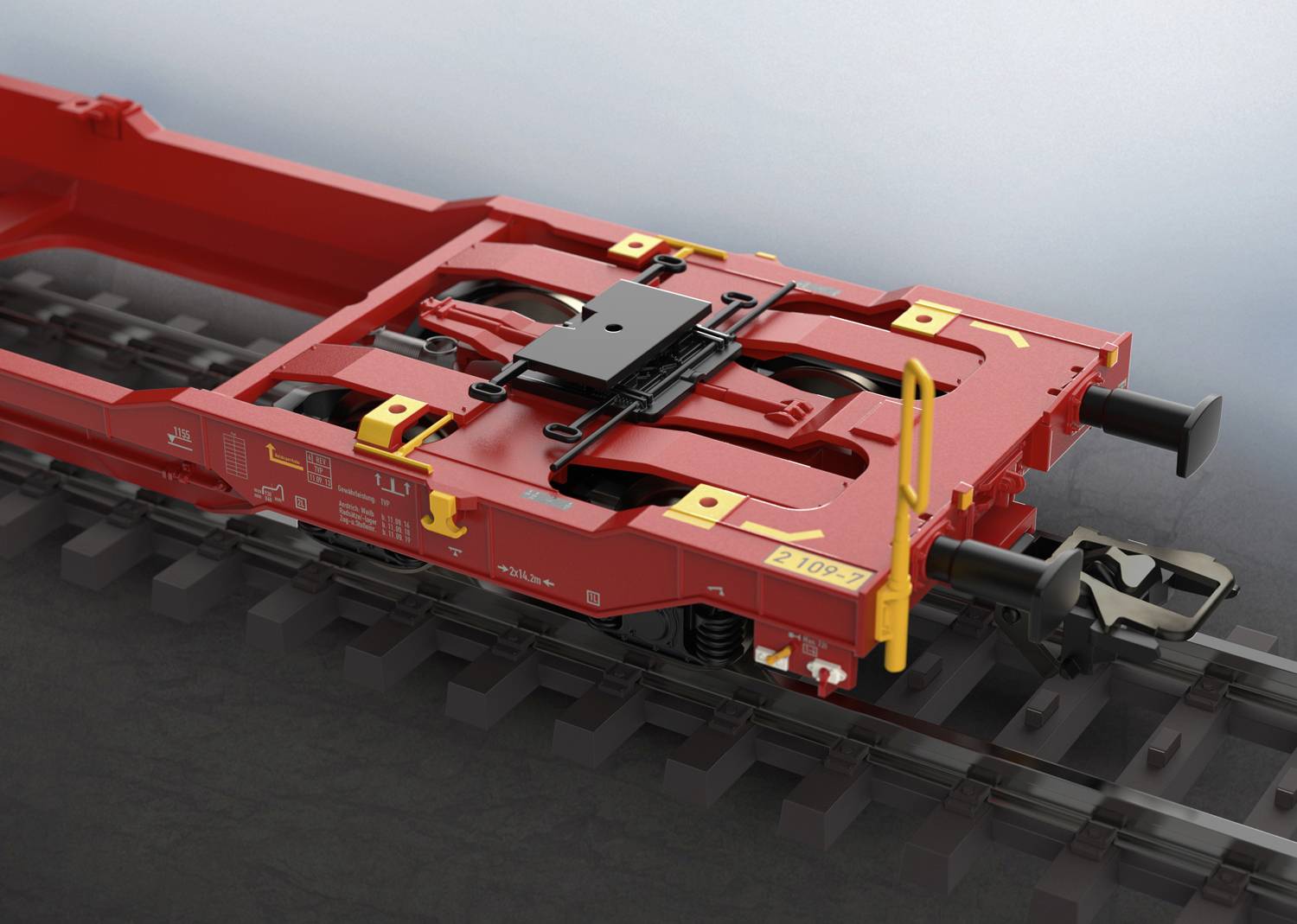 Rot-orange Eisenbahnfahrgestell, speziell entworfen für den sicheren Transport von Containern auf Schienen, auf Gleisen abgebildet.