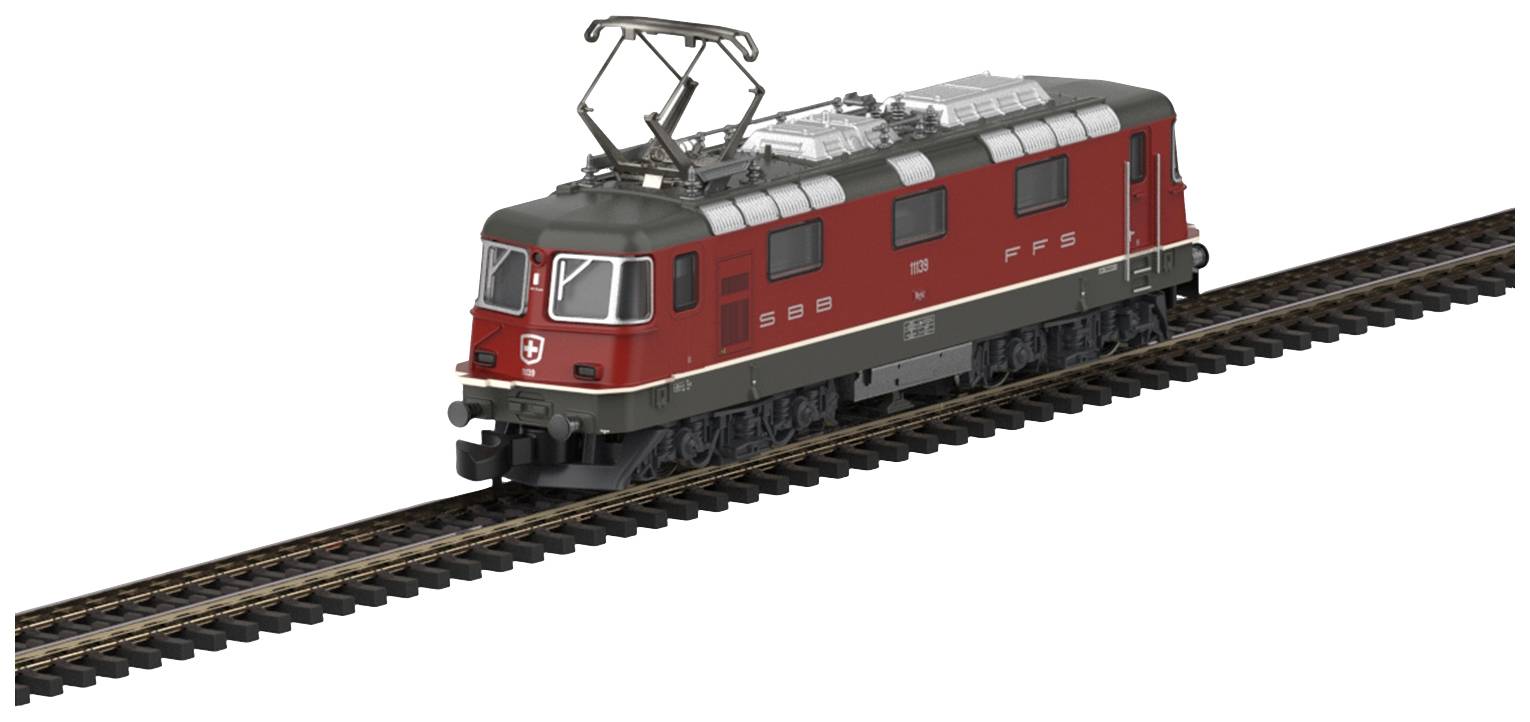 Eine rote Elektrolokomotive der Schweizerischen Bundesbahnen (SBB) fährt auf einem Gleis. Sie ist detailgetreu mit schwarzem Fahrgestell.