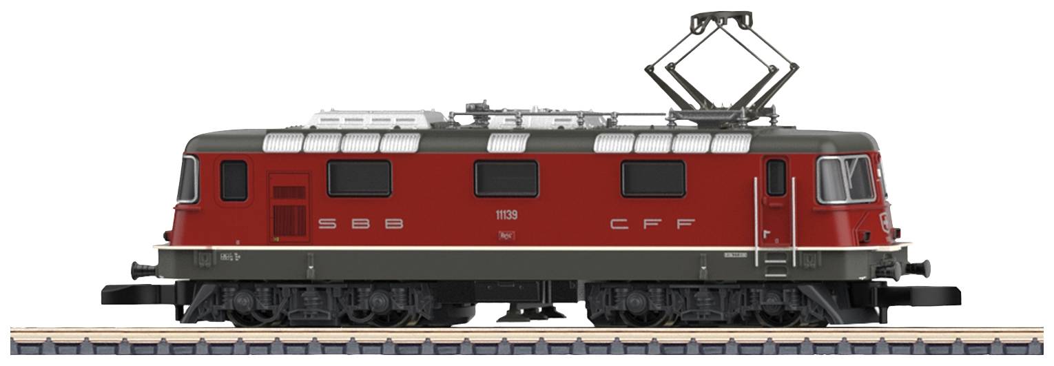 Rotes Modellbahn-Lokomotiv von SBB CFF auf Schienen, seitliche Ansicht.