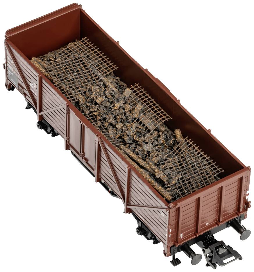 Offener Güterwagen mit rostigem Schrott und Metallgittern beladen. Der Wagen ist braun und auf einem Gleis platziert.