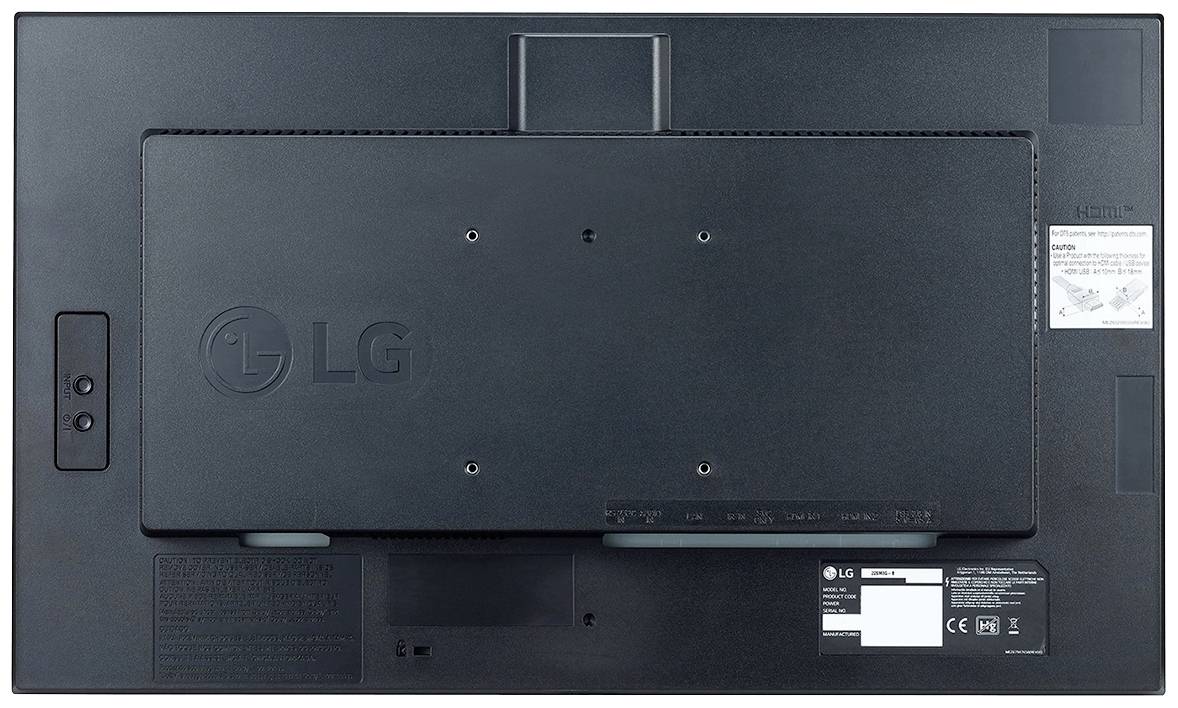 Rückseite eines LG Monitors mit Wandhalterungsbefestigungen und Etiketten mit technischen Informationen und Sicherheits-Icons.
