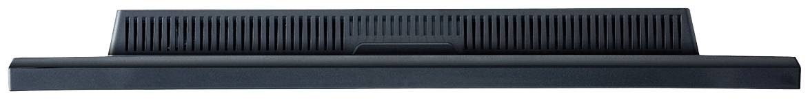 Ein schwarzer Lautsprecher, rechteckig und flach, mit gerilltem Design an der Vorderseite.