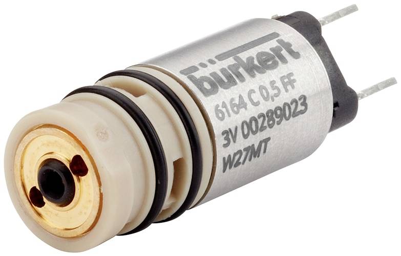 Elektrisches Ventil mit der Aufschrift 'burkert 6164 C 0.5 FF 3V 00289023'. Zwei Drähte für elektrische Verbindung sichtbar.