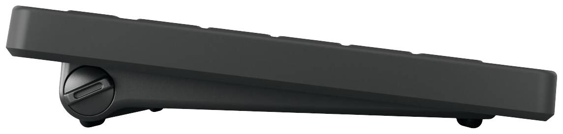 Eine schwarze, schlanke Tastatur von der Seite gesehen, mit verstellbarem Neigungswinkel durch einen drehbaren Fuß auf der linken Seite.