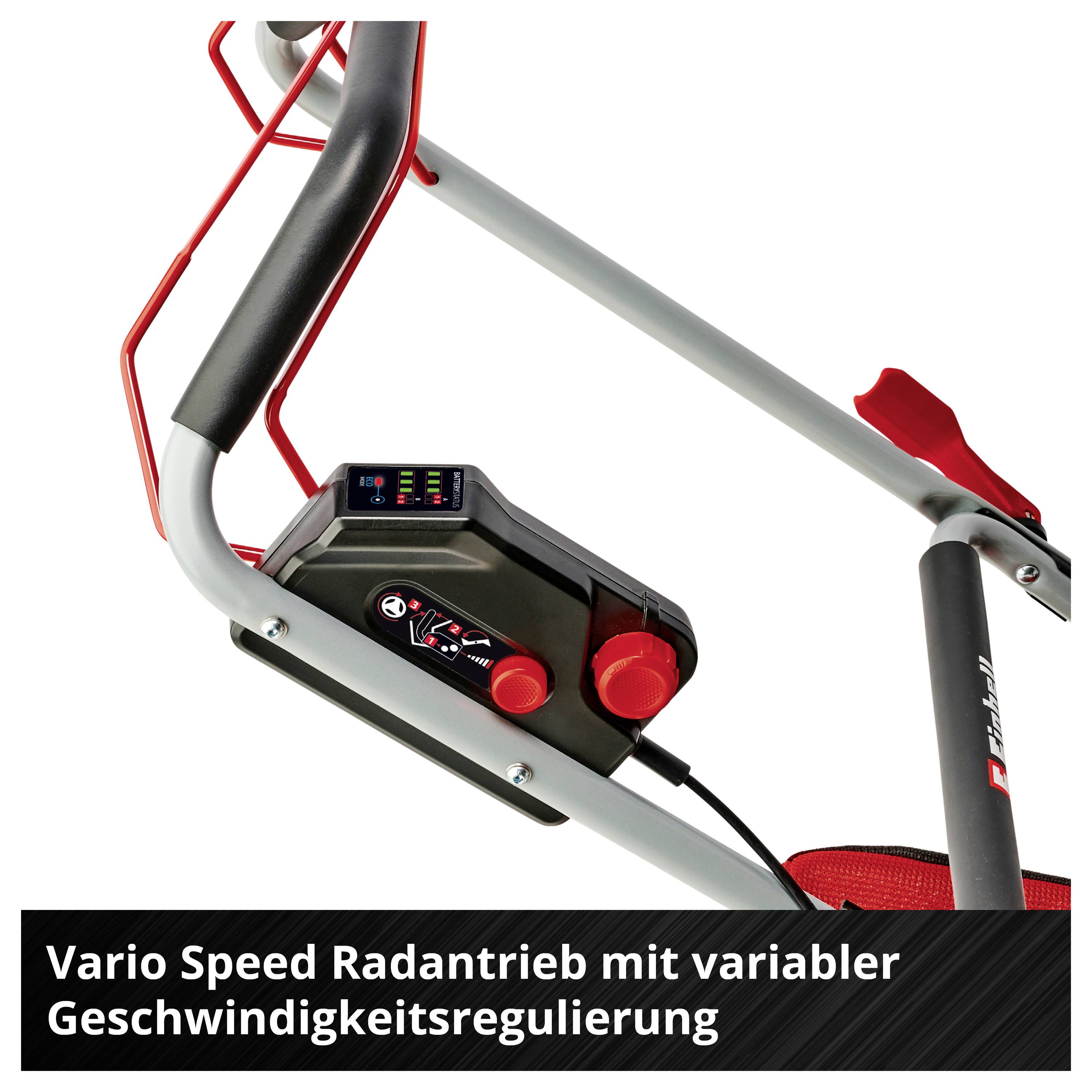 Nahaufnahme eines Rasenmähers mit 'Vario Speed Radantrieb' und variabler Geschwindigkeitsregulierung; Bedienelement und Steuerbox sichtbar.