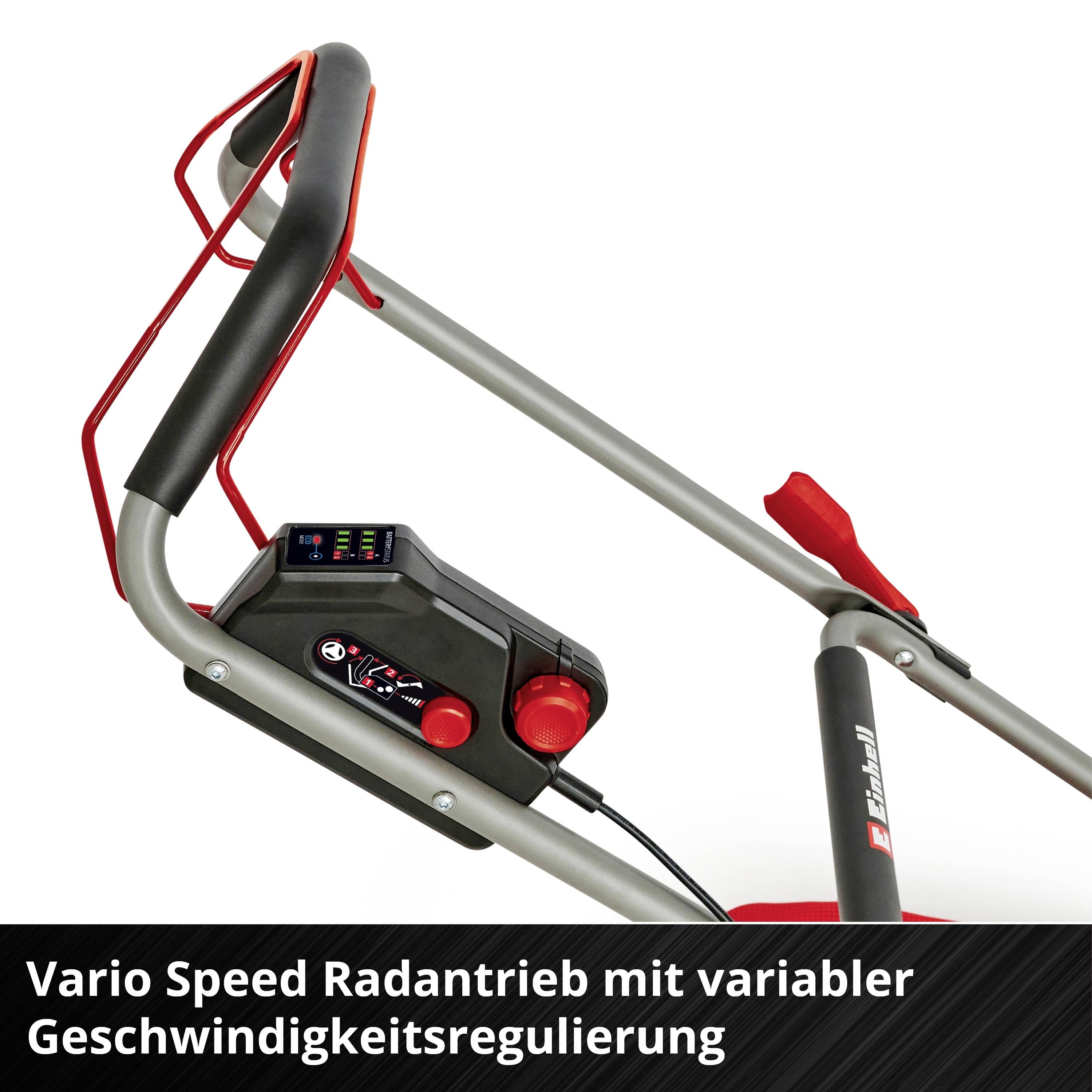 Rasenmähergriff mit Steuerung, rotem Hebel und Geschwindigkeitsregler. Text: Vario Speed Radantrieb mit variabler Geschwindigkeitsregulierung.