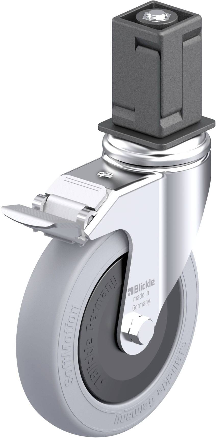 Rollenrad aus Metall und Gummi mit gebremstem Drehgelenk, geeignet für Möbel oder Wagen. Im Hintergrund ist ein Befestigungselement sichtbar.