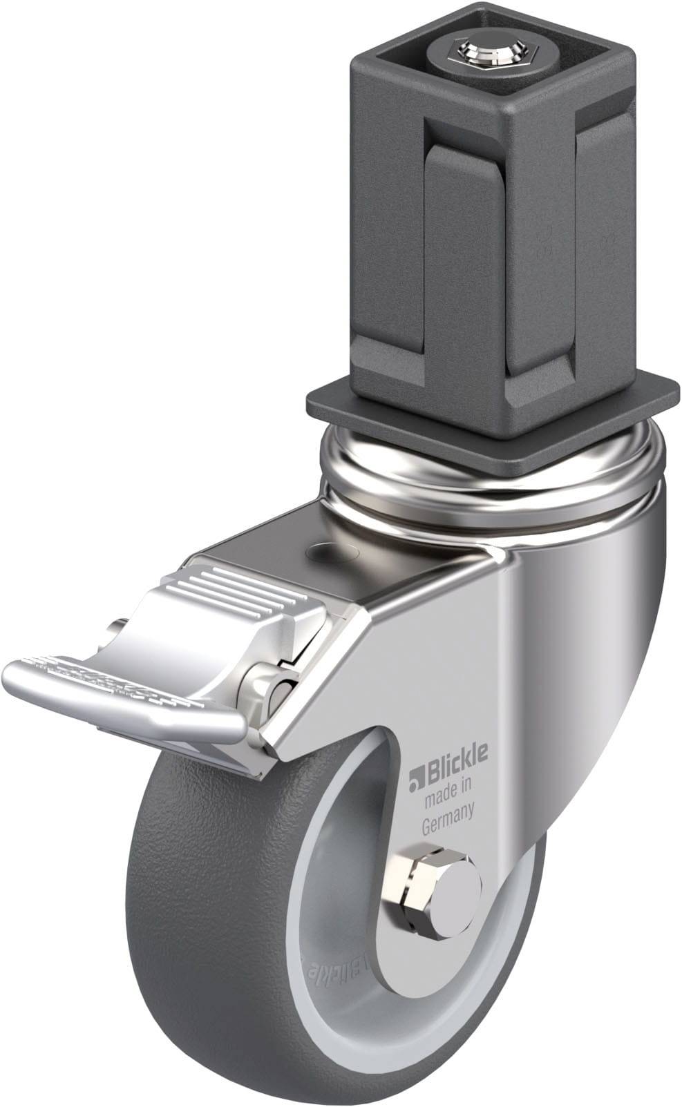 Schwenkrolle aus Edelstahl mit grauem Rad und Bremse, hergestellt in Deutschland.