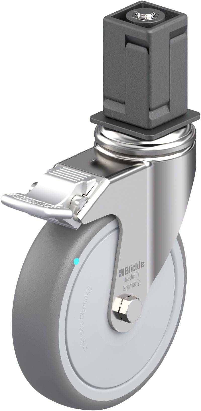 Metallisches Lenkrollengehäuse mit grauem Rad und umklappbarer Bremse. Geeignet für Möbel oder Geräte, die beweglich sein sollen.