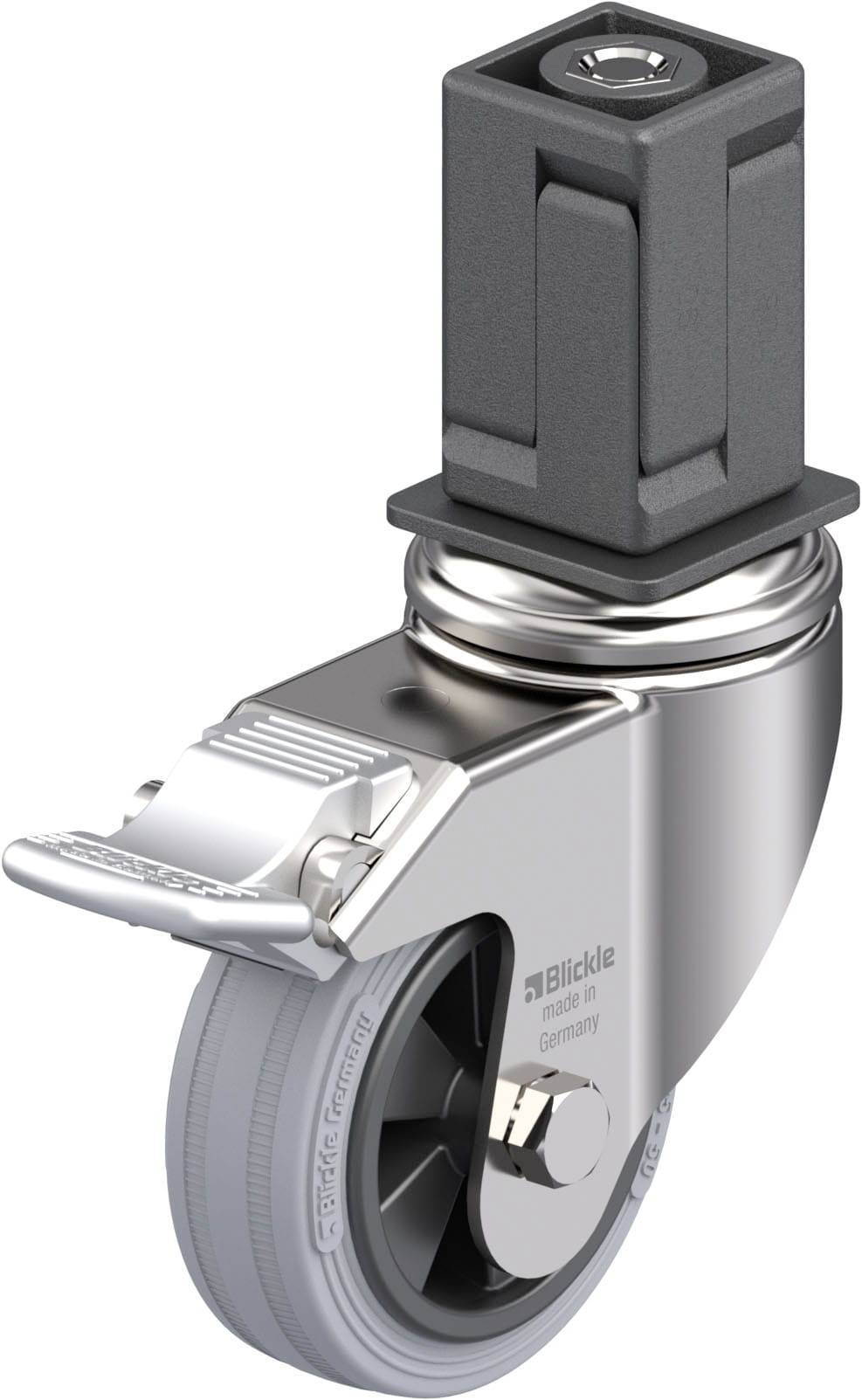 Eine graue Industriebremse aus Metall und Gummi mit rechteckigem Befestigungsaufsatz. Geeignet für schwere Lasten.