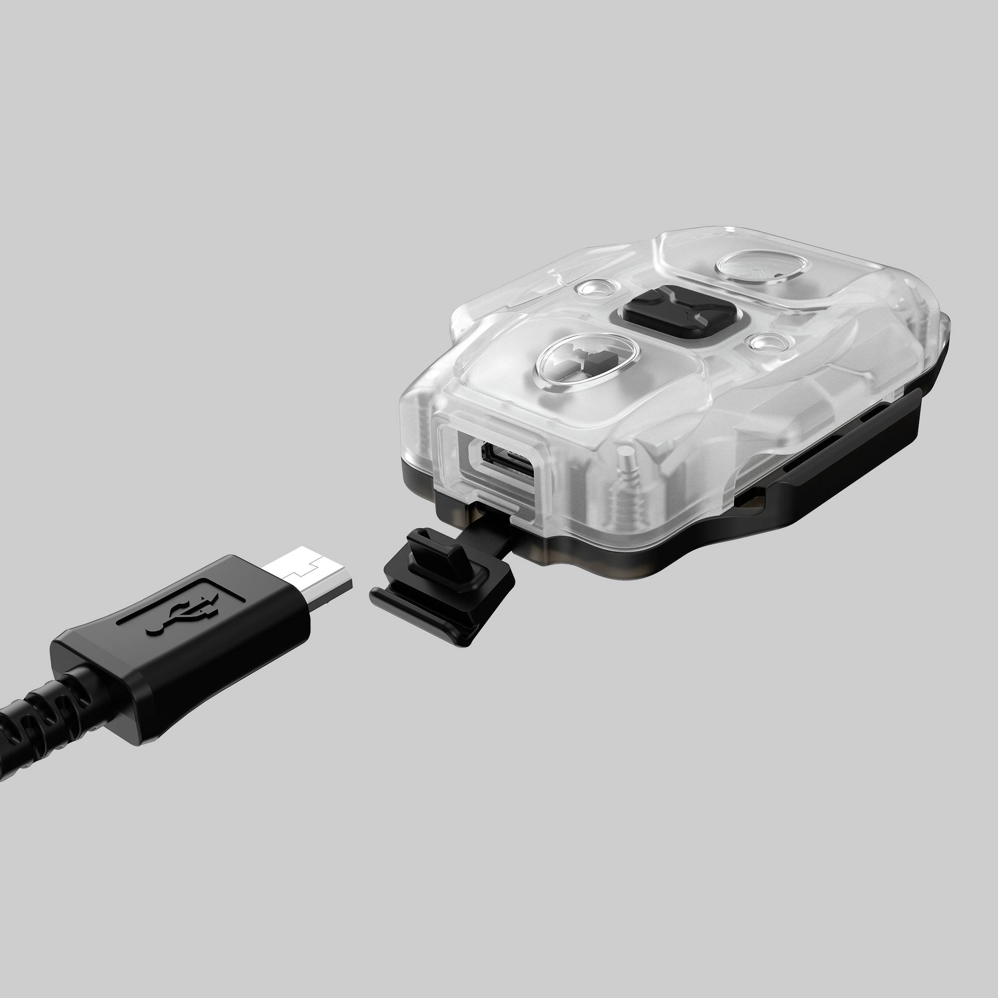 Ein durchsichtiges elektronisches Gerät mit USB-Anschluss, das ein kleines Gehäuse hat und mit einem abgetrennten Kabel endet.
