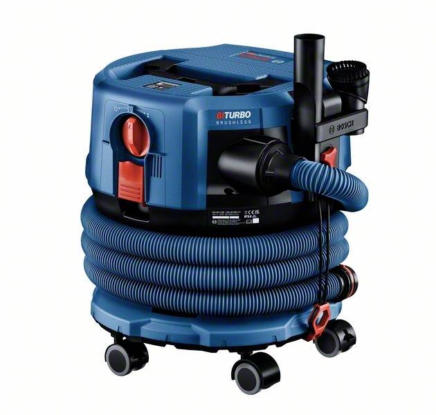 Ein blauer Industriestaubsauger mit roten Akzenten und Schlauch, auf Rollen stehend, geeignet für Baustellen oder Werkstätten.