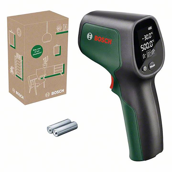 Infrarot-Thermometer von Bosch mit Display, zeigt Temperatur. Verpackung und zwei AA-Batterien daneben.