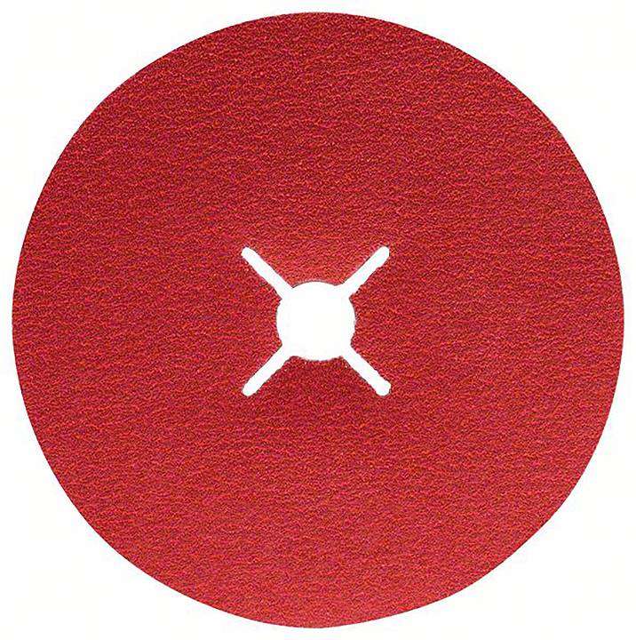 Rotes Schleifpapier mit kreisförmigem Ausschnitt in der Mitte, das zur Bearbeitung von Oberflächen verwendet wird.