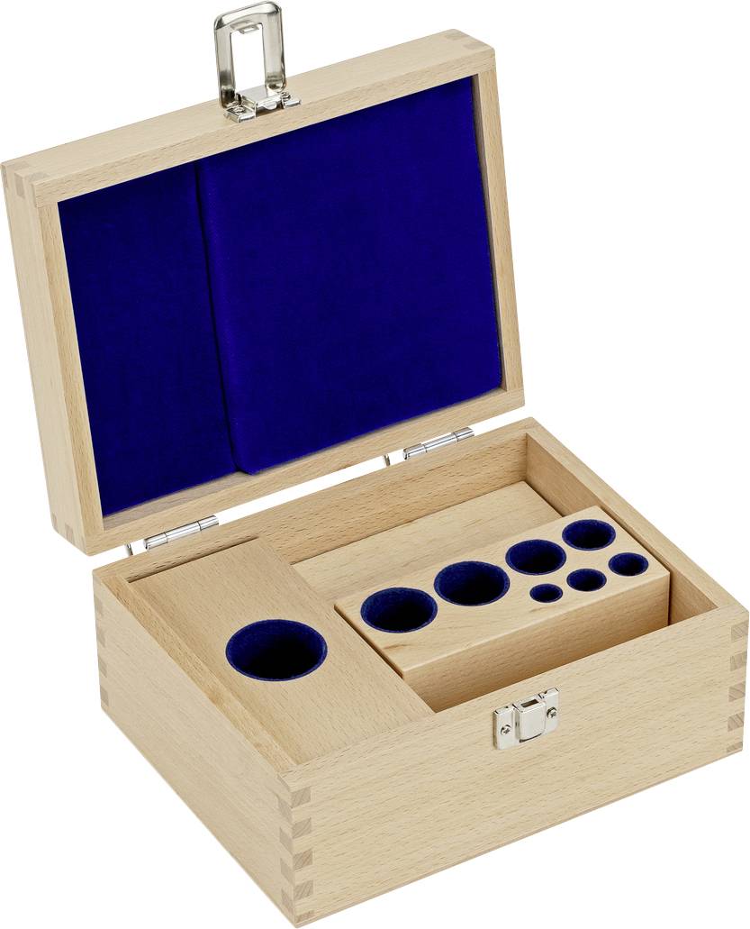 Offene Holzkiste mit blauem Samtfutter, enthält verschiedene Fächer und runde Einlagen, geeignet für Uhren oder Schmuckaufbewahrung.