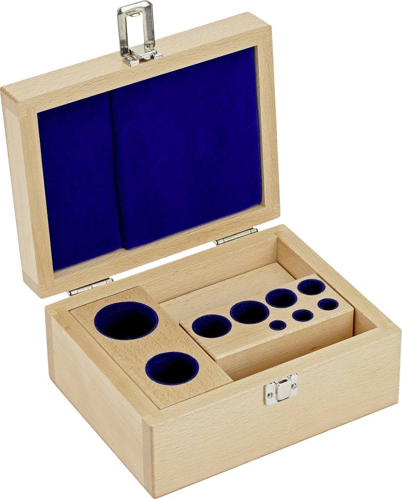 Holzkiste mit Metallschloss, innen mit blauer Samtauskleidung und mehreren runden Aussparungen unterschiedlicher Größe.