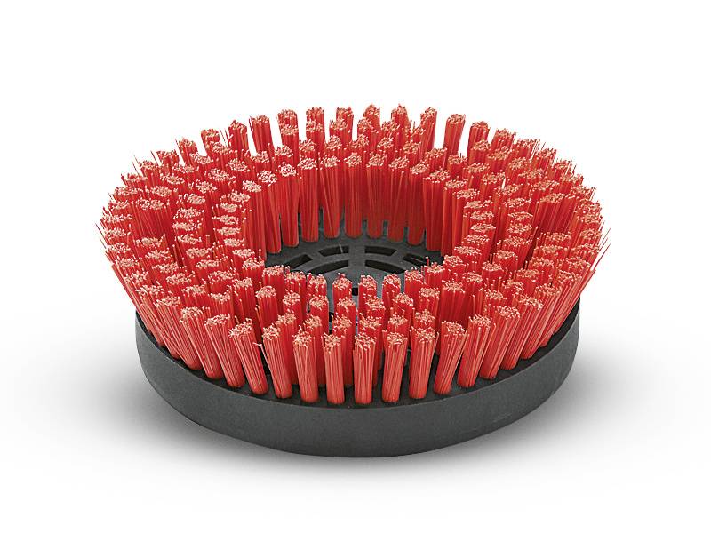 Runde Reinigungsbürste mit roten Borsten auf schwarzem Sockel.