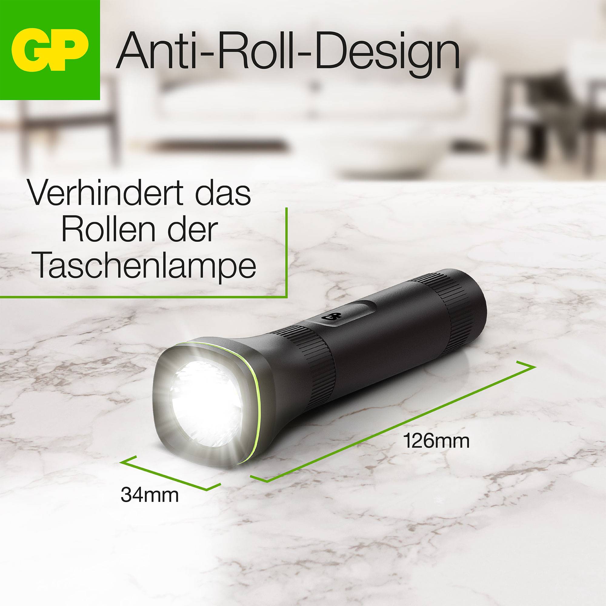 Schwarze Taschenlampe liegt auf Tisch. Text: 'Anti-Roll-Design verhindert das Rollen der Taschenlampe'. Maße: 126mm lang, 34mm Durchmesser.