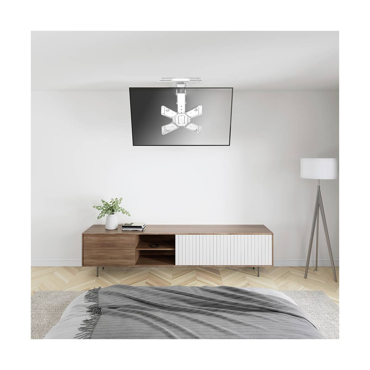 Wohnzimmer mit modernem Möbel und minimalistischem Dekor; Deckenlampe im Mittelpunkt, Holzboden, weiße Wände, Stehlampe rechts.