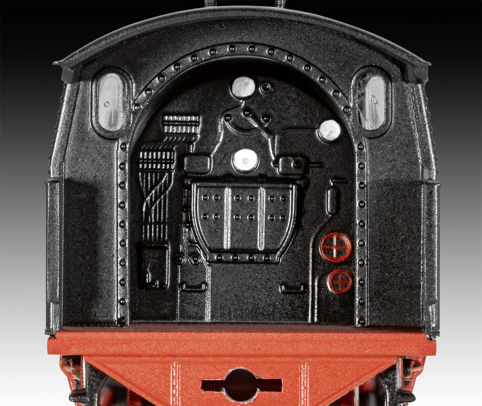 Ein schwarzer, rechteckiger Metallkasten mit roten Akzenten und sichtbaren mechanischen Details an der Vorderseite.