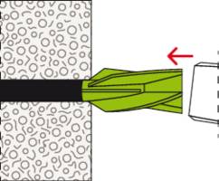 Prinzip der Wirkungsweise von Rahmentechnik: Ein Dübel wird in eine strukturierte Wand gedreht, Grafik zeigt Schraubenrichtung.