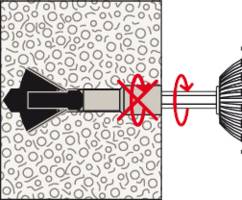 Ein Bohrkopf bohrt in eine Wand aus dichtem Material. Ein rotes 'X' und ein Pfeil deuten an, dass keine Drehbewegung erfolgen soll.