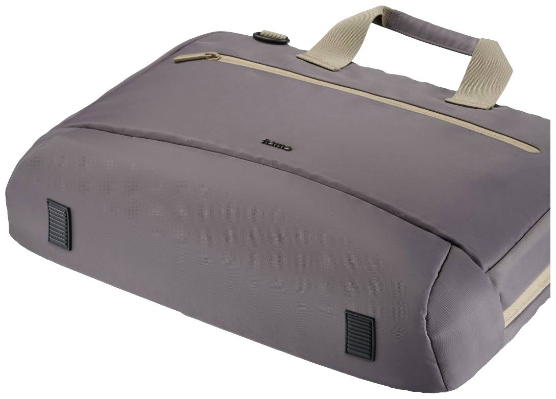 Hellgraue Tragetasche mit beigen Griffen und Reißverschlussfach oben. Eignet sich zur Aufbewahrung von verschiedenen Dingen.