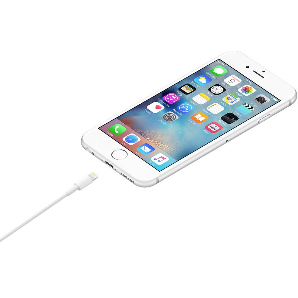 Ein Smartphone mit sichtbarem Homescreen liegt schräg. Ein Ladekabel ist angeschlossen, deutet auf eine Ladefunktion hin.