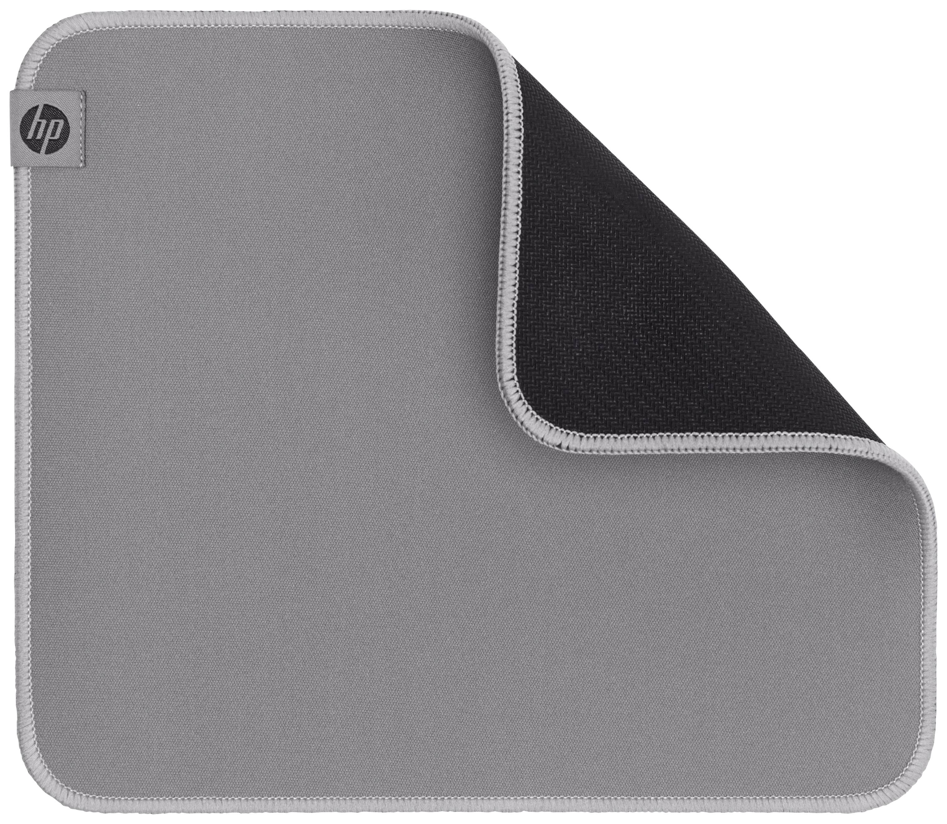 Ein graues HP-Mousepad, teilweise umgeklappt, zeigt die schwarze Unterseite.