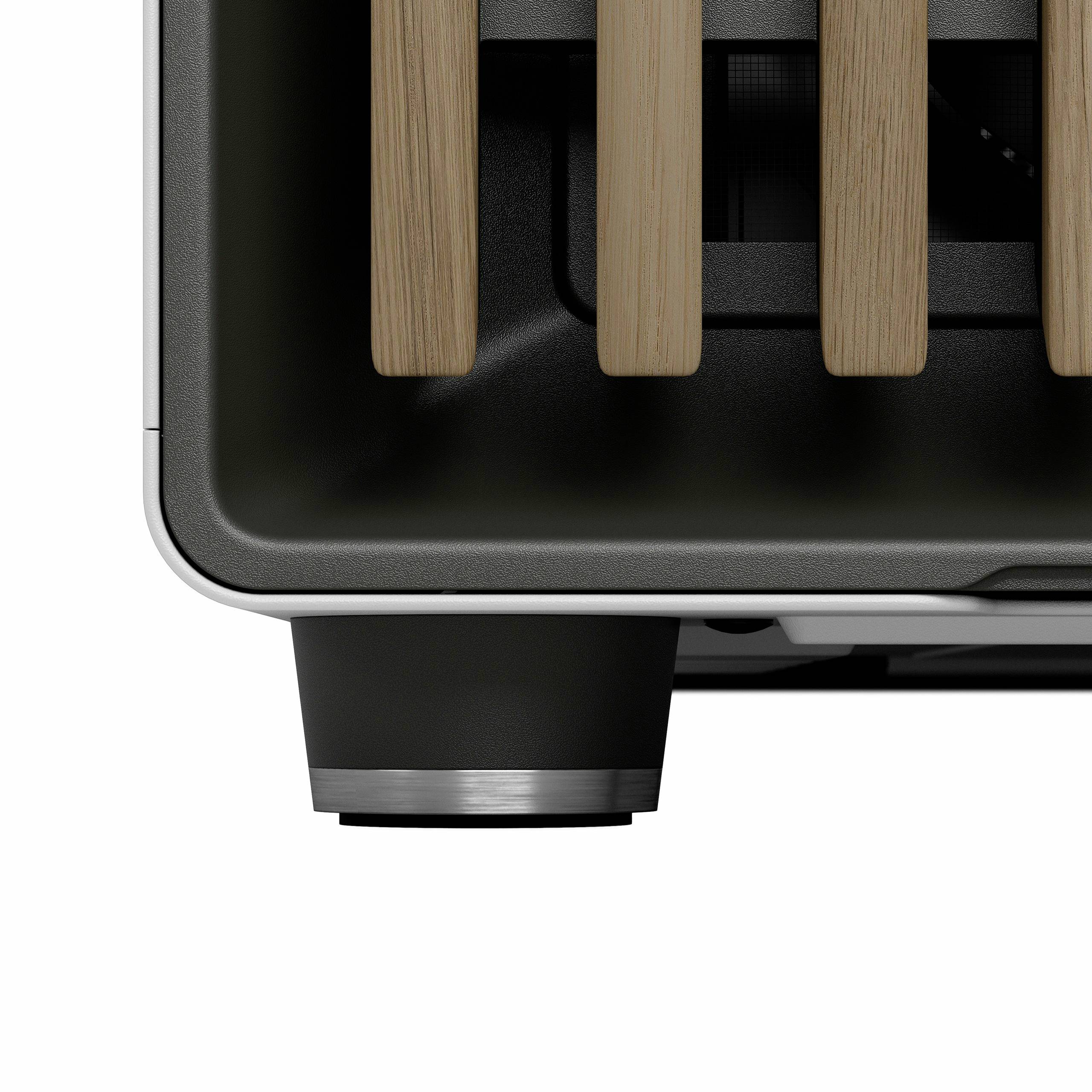 Ein Toaster mit zwei Schlitzen aus Edelstahl und Holzdetails, Ansicht von der Seite.
