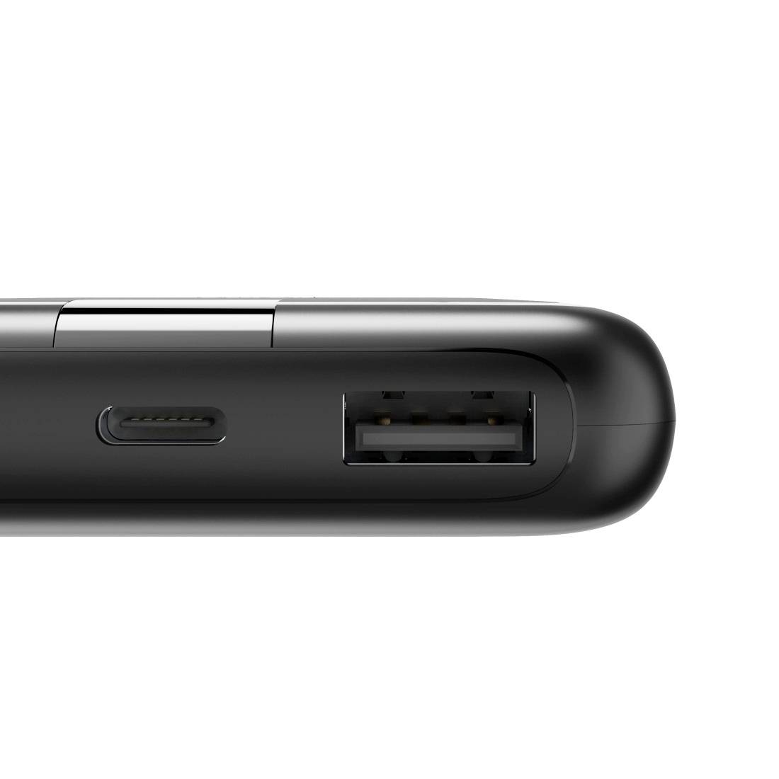 Ein schwarzes Gerät mit einem USB-A- und einem USB-C-Anschluss sichtbar an der Seite. Es scheint ein elektronisches Ladegerät zu sein.