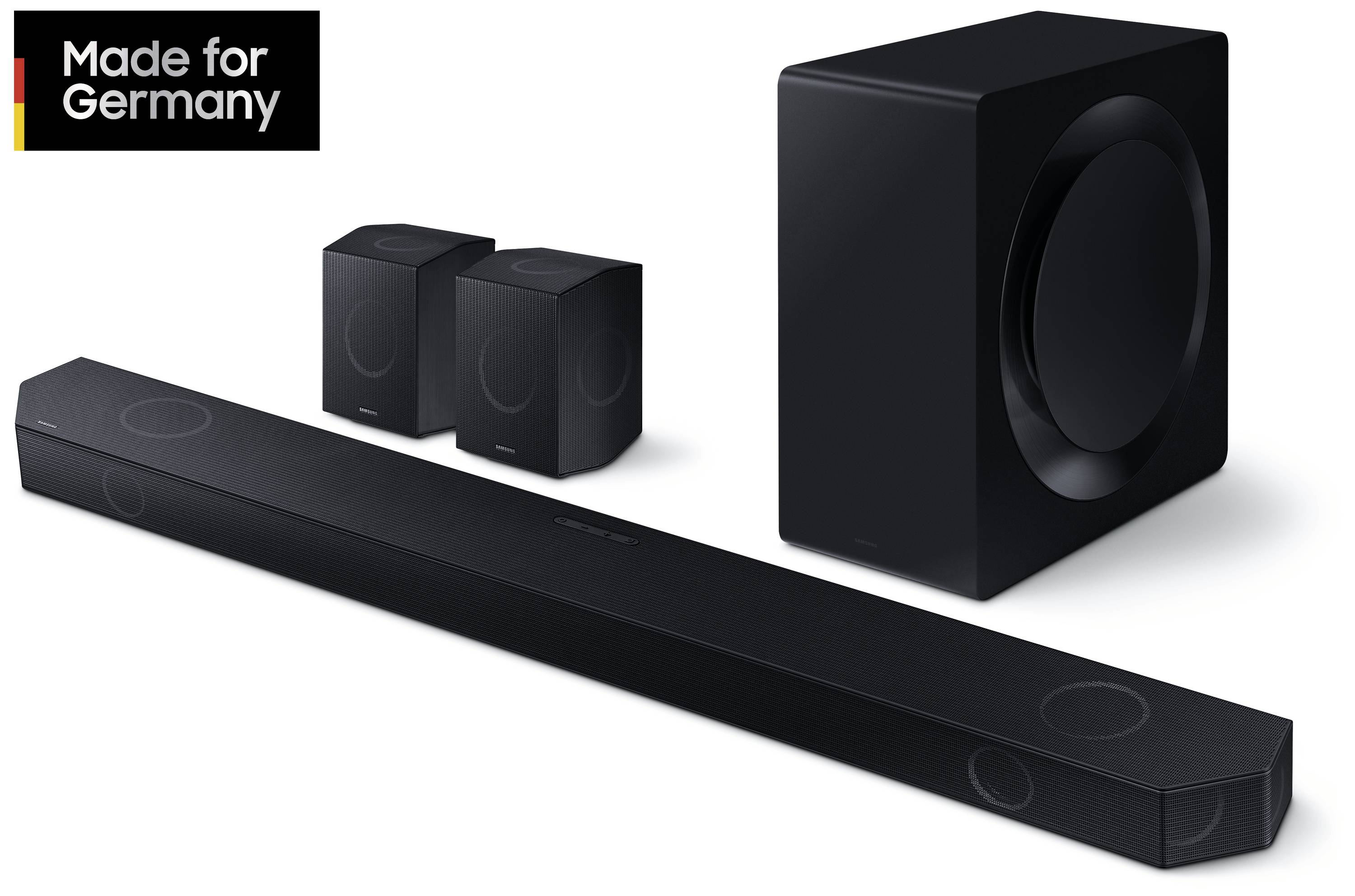 Schwarze Soundbar mit zwei Lautsprechern und Subwoofer. Text im Bild: 'Made for Germany'. Audio-System in modernem Design.